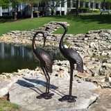 Antique Bronze Garden Crane Pair Statue - Upright and Preening Sculpture Set (Male 19" W x 10" D x 43.5" H; Female 12" W x 10" D x 39.5" H)