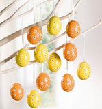 Decorative Yellow / Orange Eggs in Sectioned Box, Set of Twelve